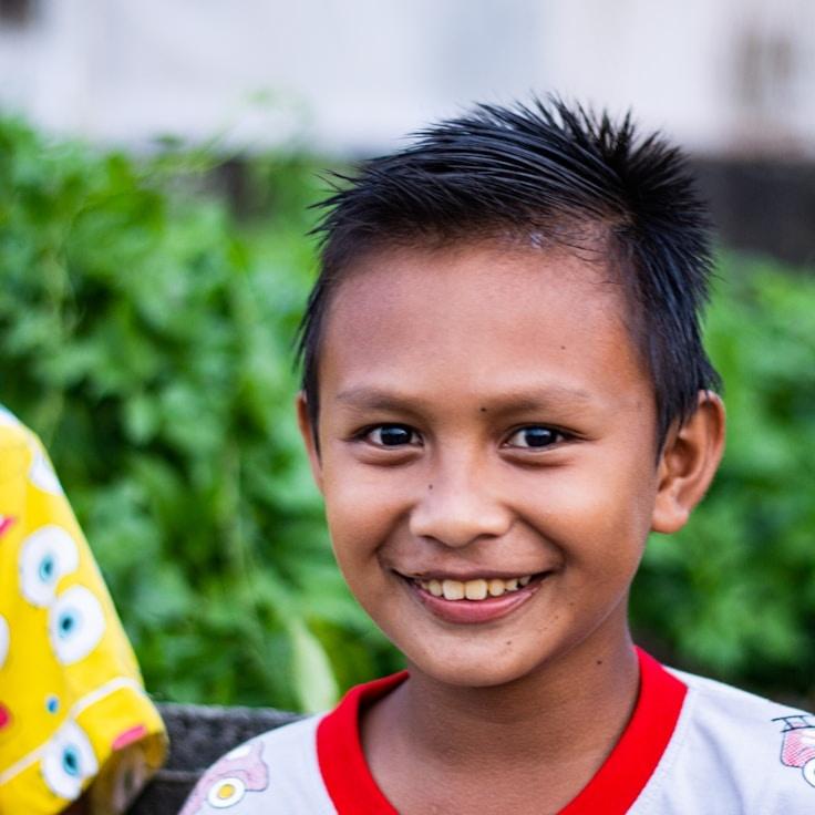 Alex Renner, Lead Design Curator at DockCabinHaven, reviewing corporate floral arrangements